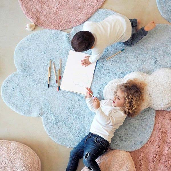 round non-toxic nursery rug with pastel star pattern