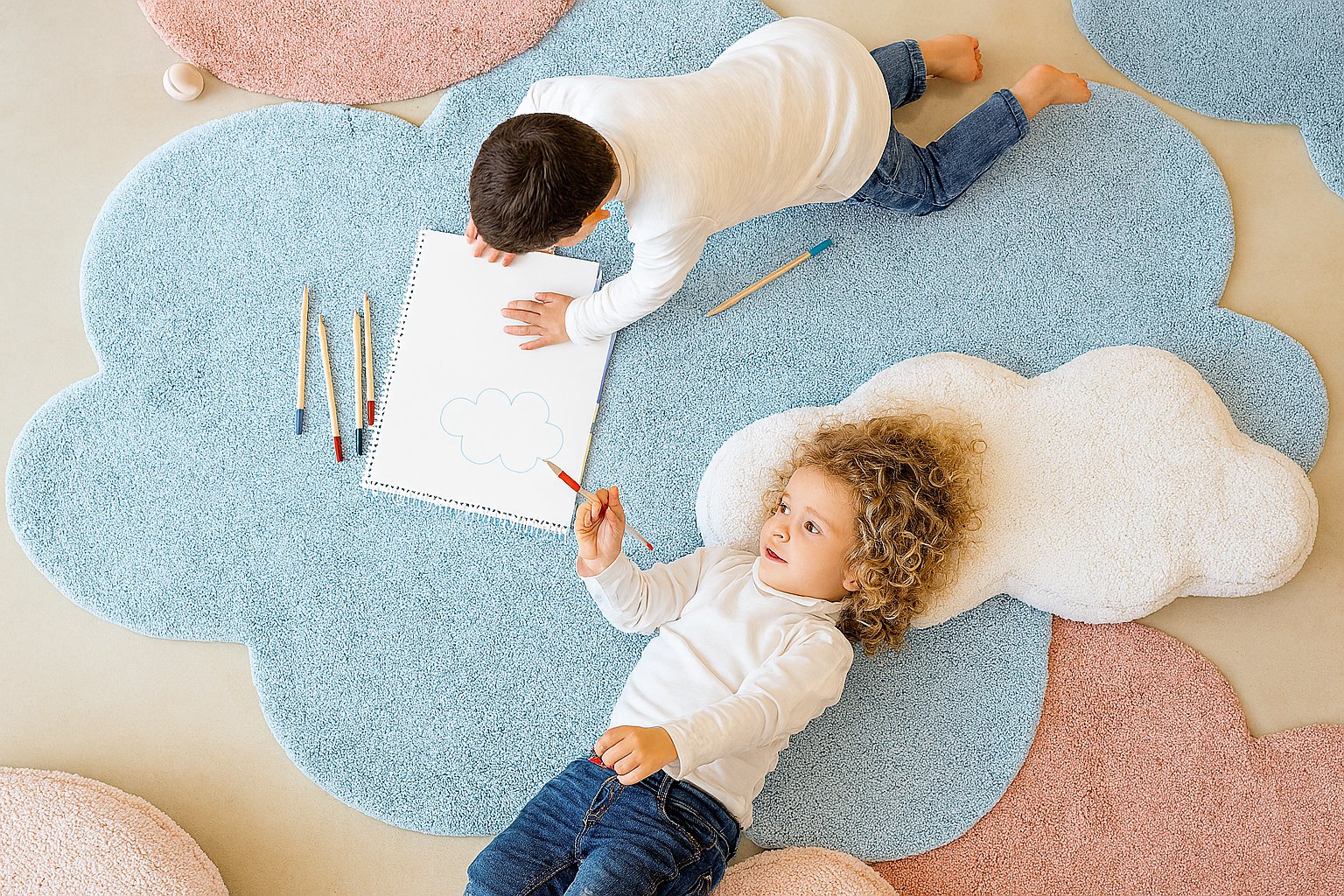 round non-toxic nursery rug with pastel star pattern