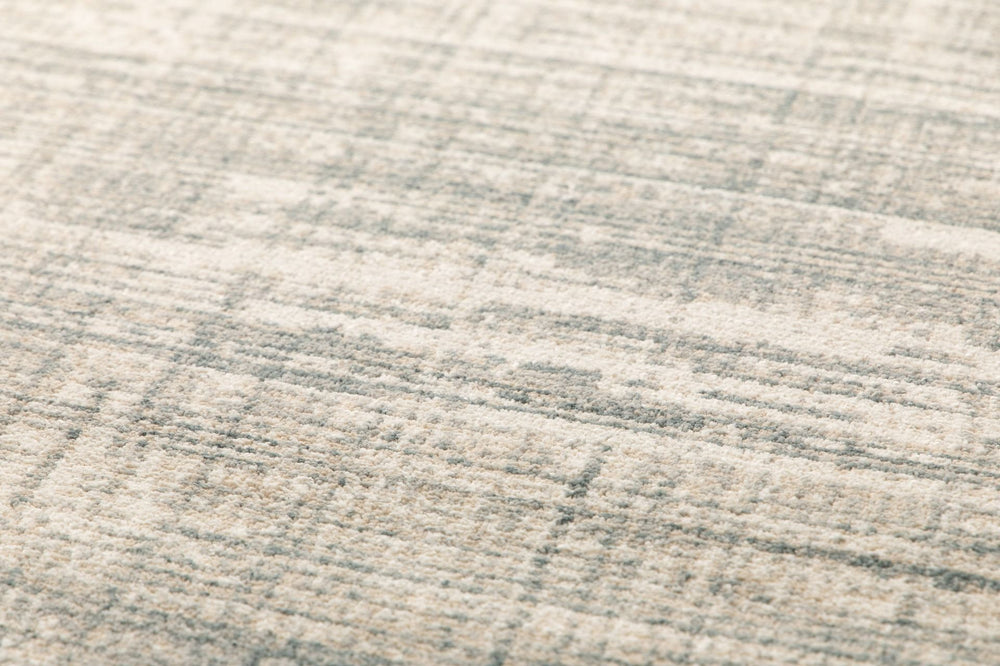 Close-up of rug surface showing woven texture.