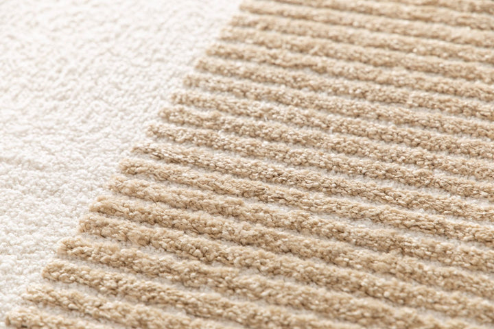 Beige rug pattern with texture.