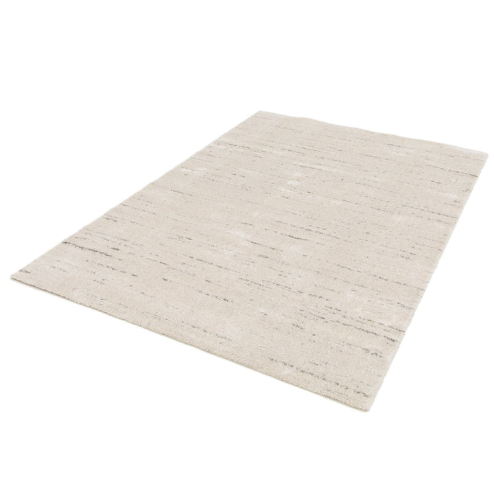 Full cream rug with scattered grey linear details.