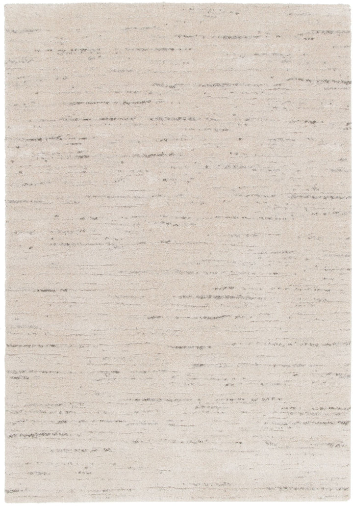 Top-down view of rectangular cream rug with grey streaks.