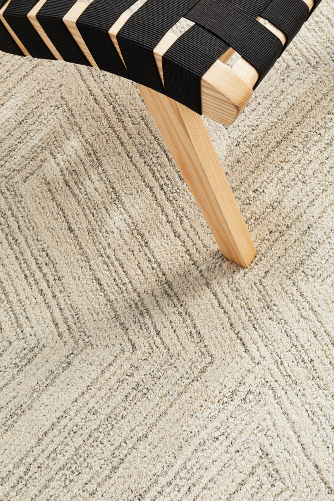 Detailed shot of Alpine 844 Silver rug showing subtle platinum and silver variations