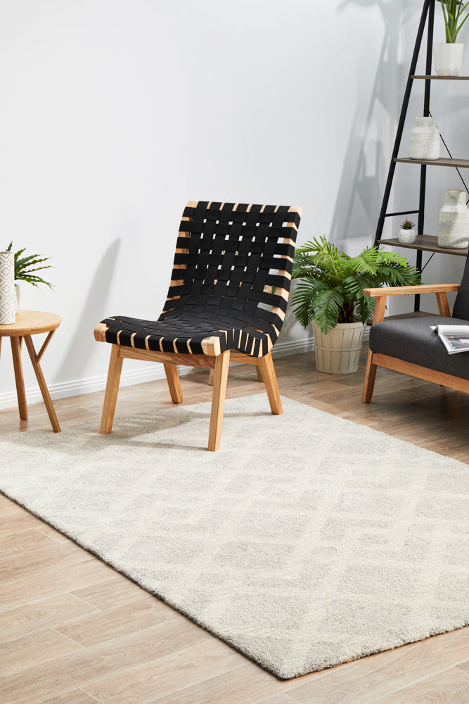 Alpine 855 Pebble rug on hardwood floor showing organic texture and natural grey colour
