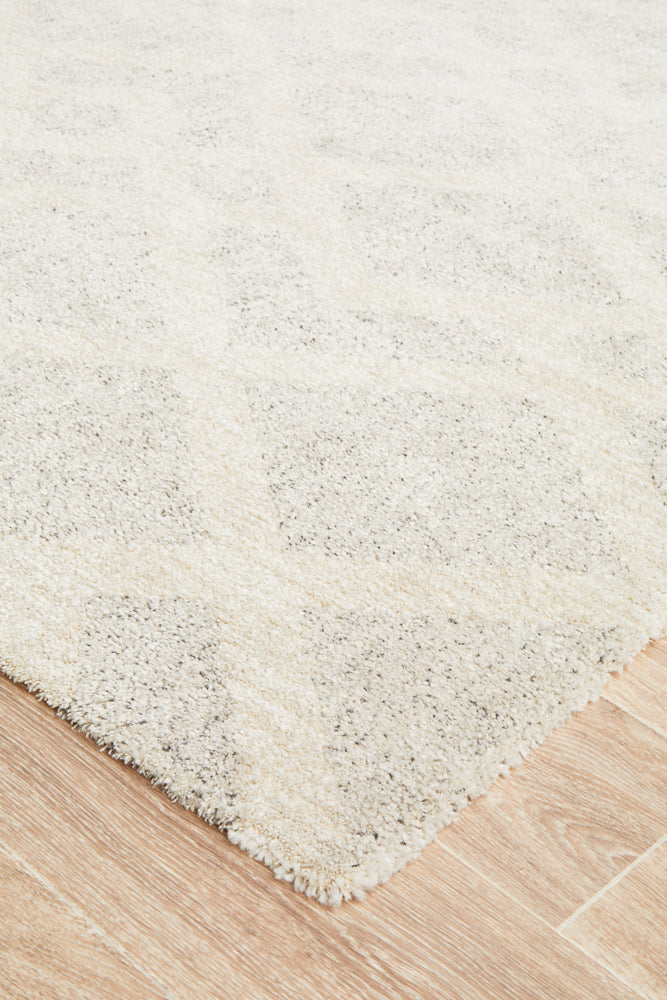 Close-up texture of Alpine 855 Pebble rug showing organic pebble high pile and weave detail