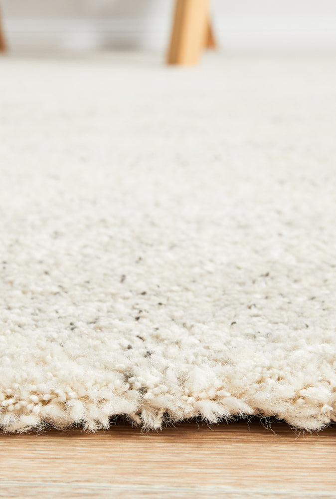 Close-up texture of Alpine 855 Pebble rug showing organic stone colours and mid shag pile detail