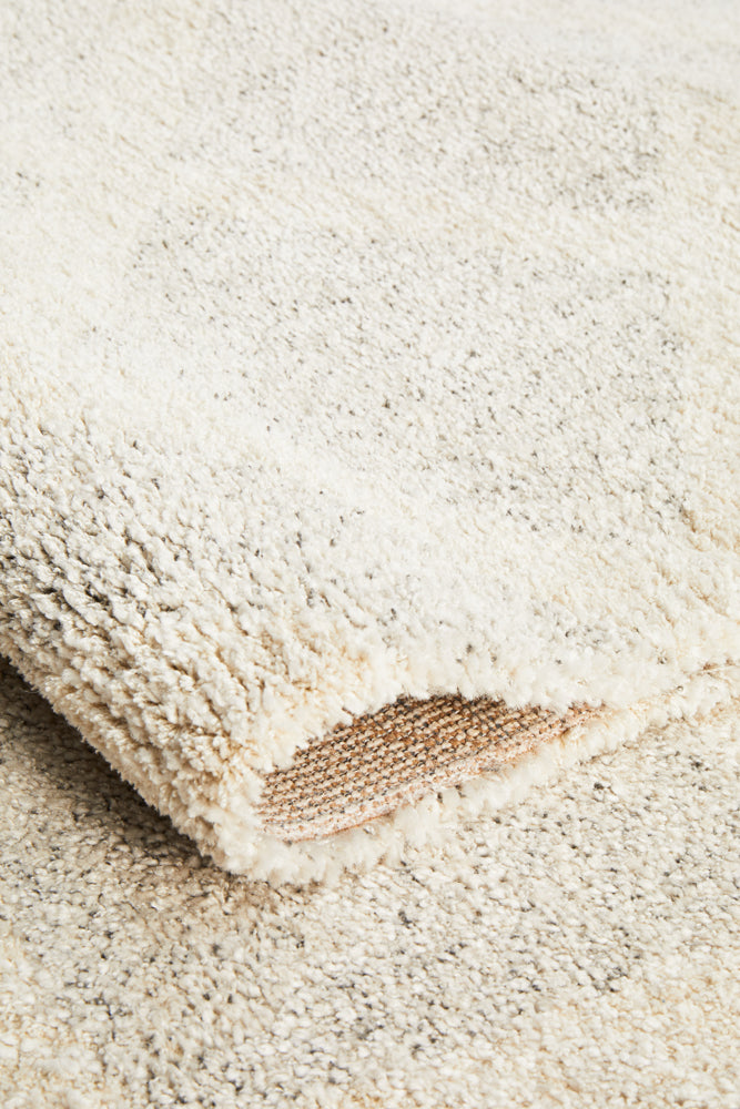 Detailed shot of Alpine 855 Pebble rug showing subtle variations in the pile and rug backing