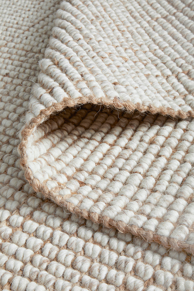 Close-up texture of Arabella natural runner showing 20mm hand-loomed wool jute pile detail