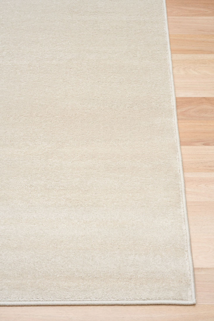 Cyrus ecru rug corner detail.