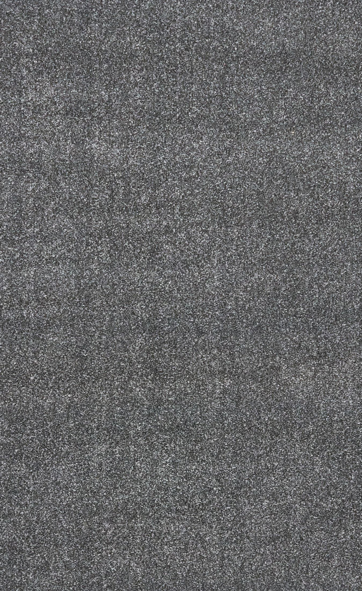 Detailed texture close-up of a grey rug surface.