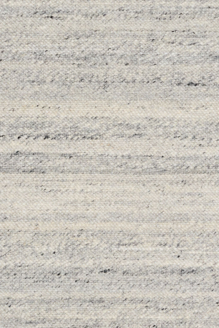 Swatch sample of silver rug showing texture and color details.