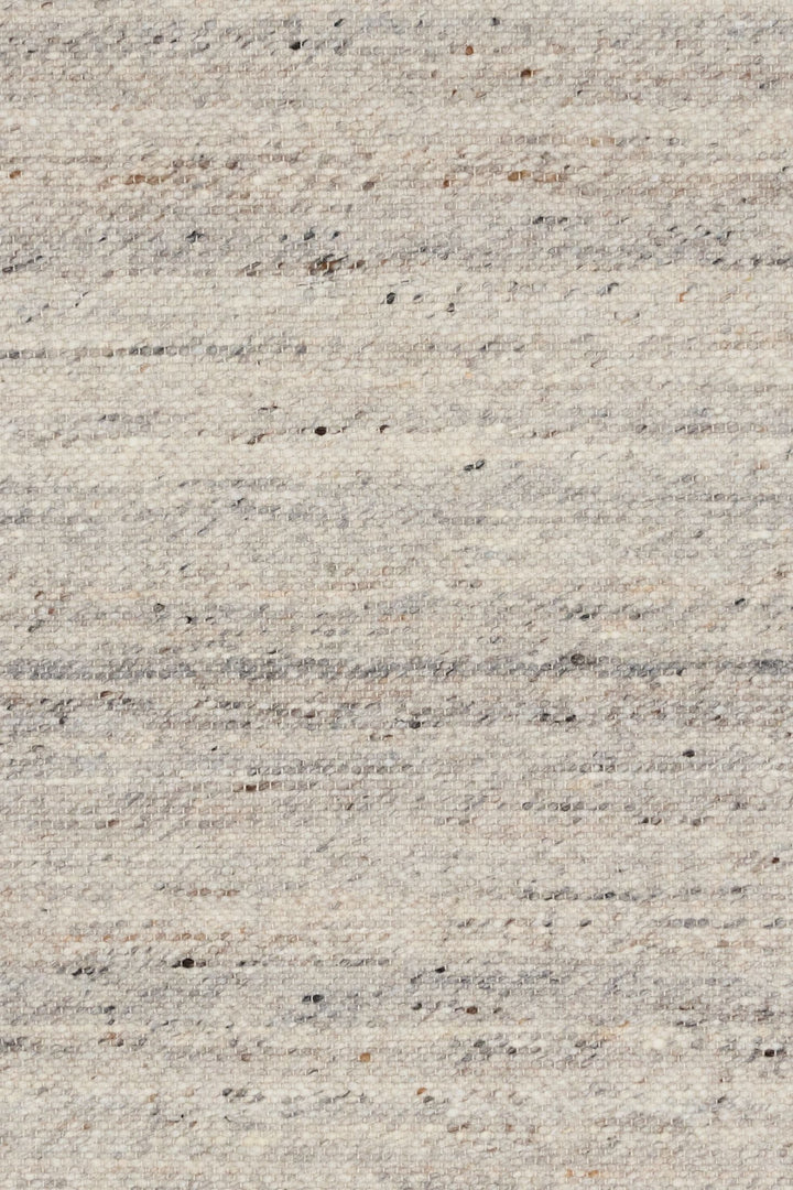 Swatch close-up showing the detailed weave of the Harmony Smoke Grey rug.
