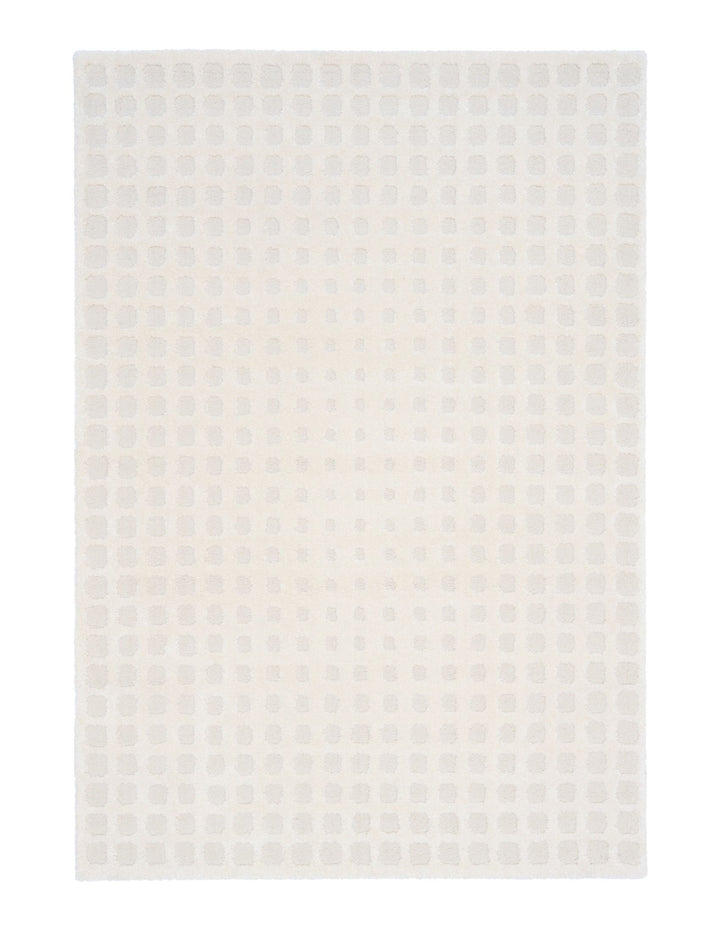 A white rug with a subtle square dot pattern.