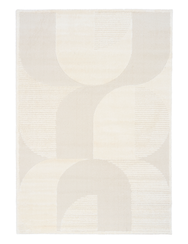 Full view of cream geometric rug on white background.