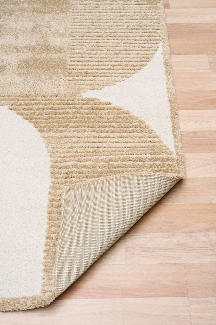 Rug corner folded showing backing.