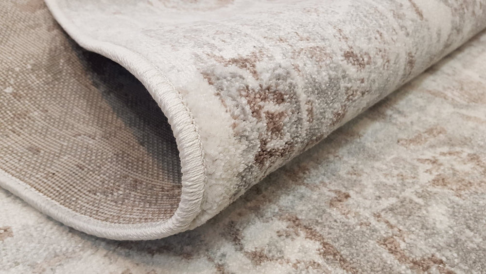 close up of transitional rug, neutral tones, vintage rug with fade design