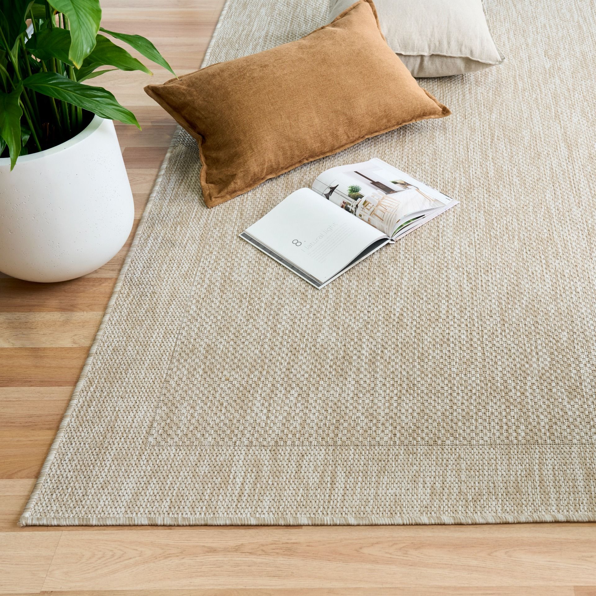 Beige outdoor alfresco rug on a deck, simple but stylish trends rugs 