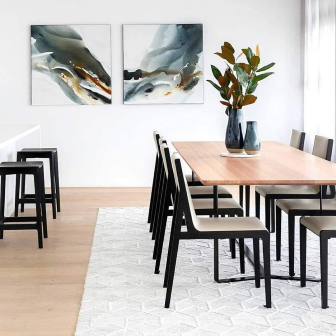 Neutral dining rug with woven texture in coastal style room