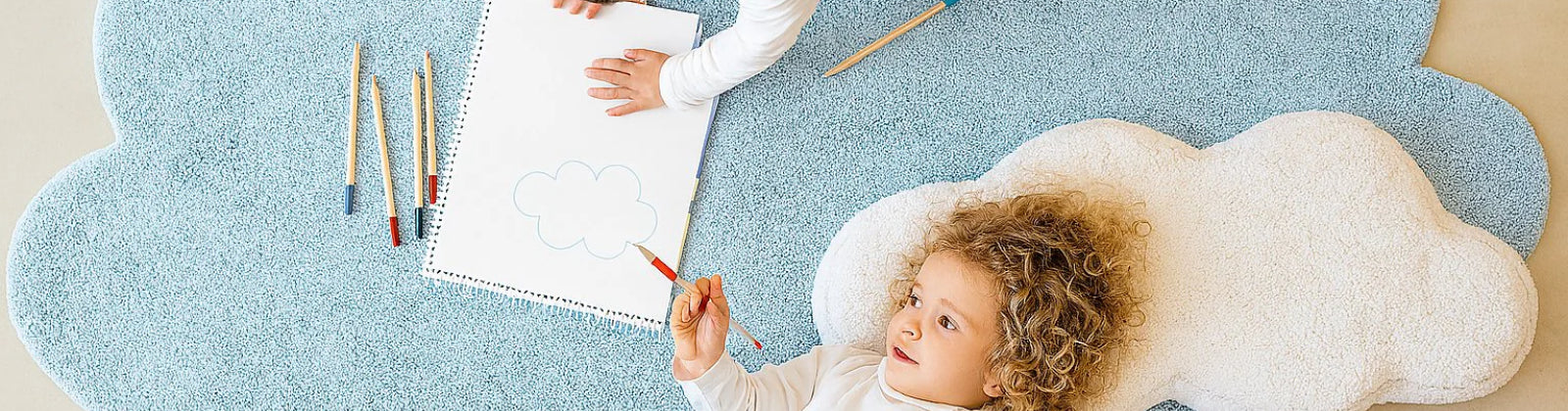 round non-toxic nursery rug with pastel star pattern