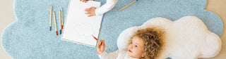round non-toxic nursery rug with pastel star pattern