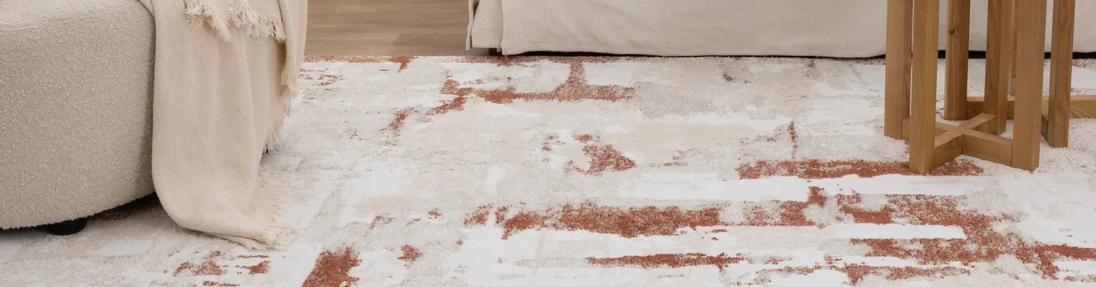Modern boho-style rug in neutral tones styled in a contemporary Australian living room with natural light and timber flooring
