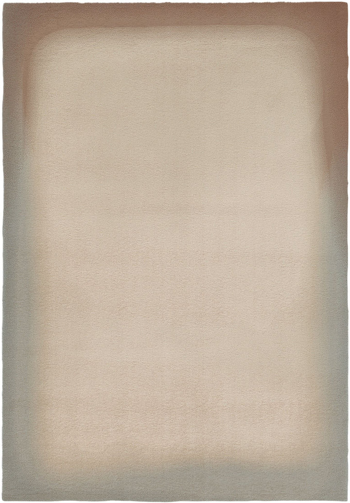 Minimalist beige rug with gradient edges in neutral tones.