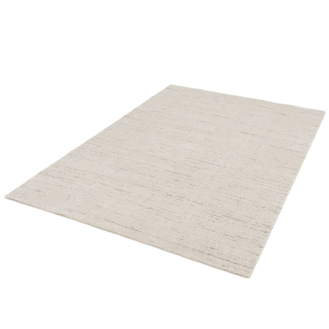 Full beige rug angled view.