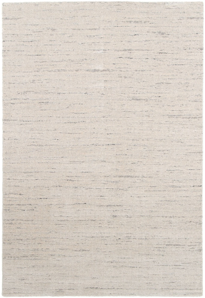Large rectangular beige rug flat.