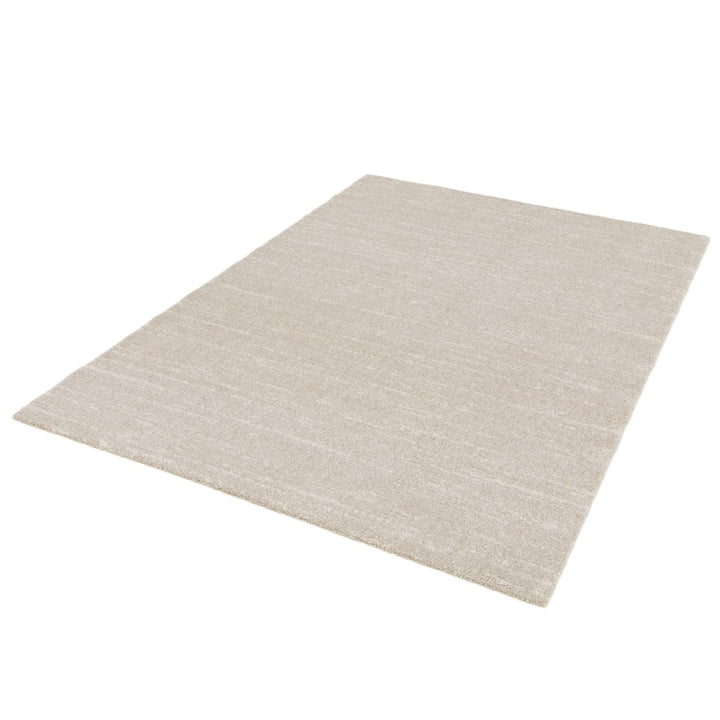 Full beige rug displayed on white background.