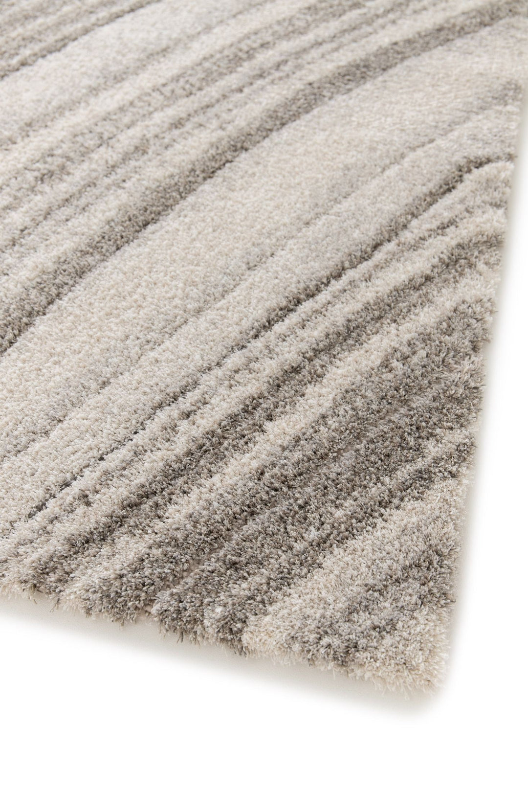 Angled close-up of grey striped rug texture.