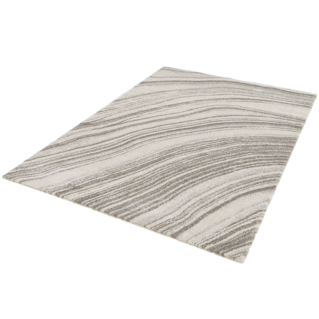 Full rectangular rug with grey wave design.