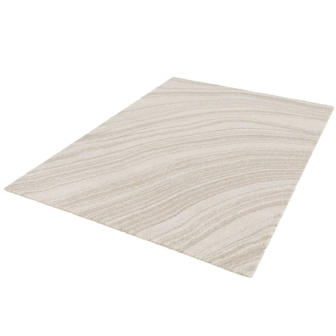 Full rectangular beige rug with soft wave design.