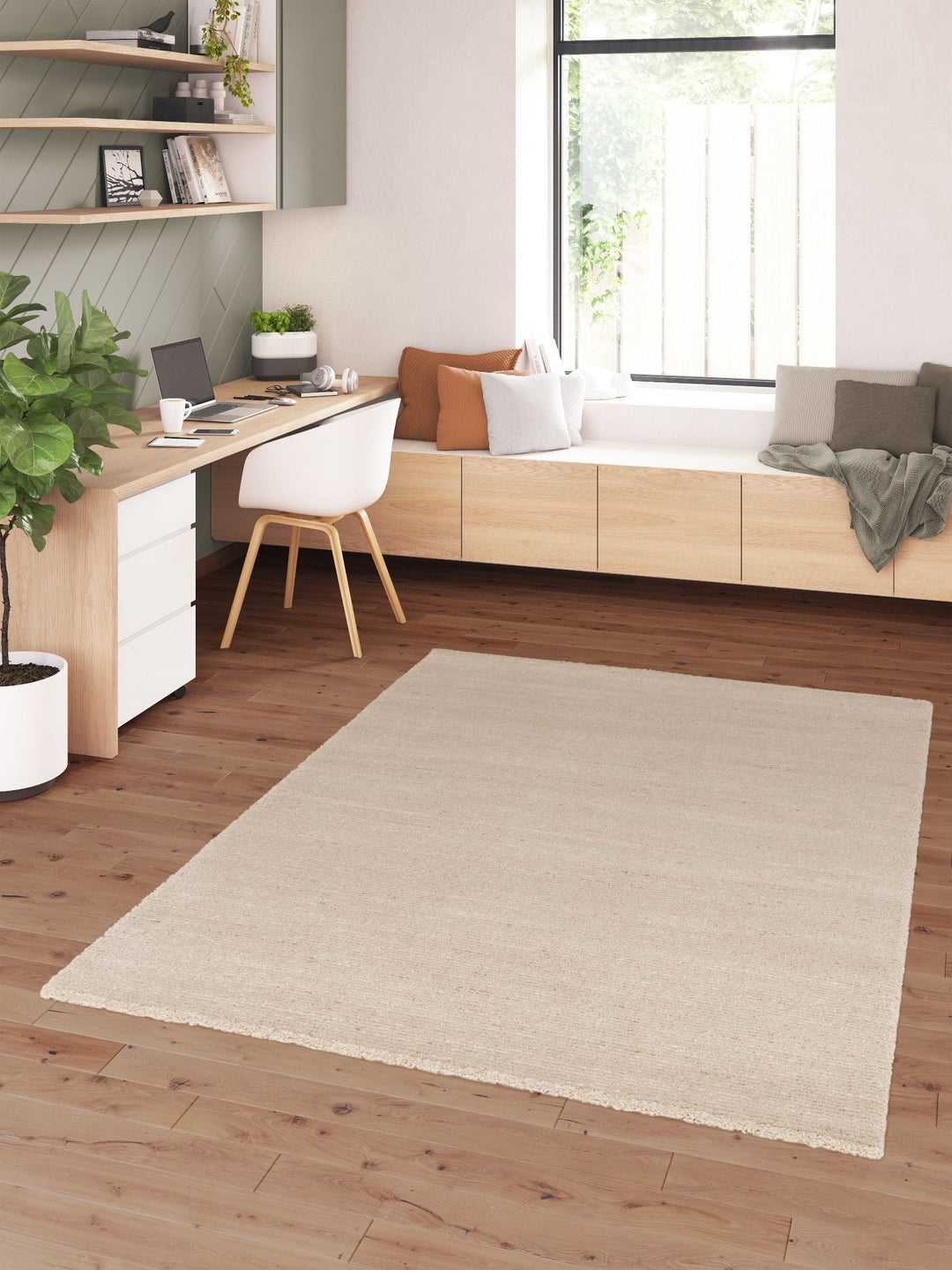 Modern home office with a light beige rug placed on wooden flooring.
