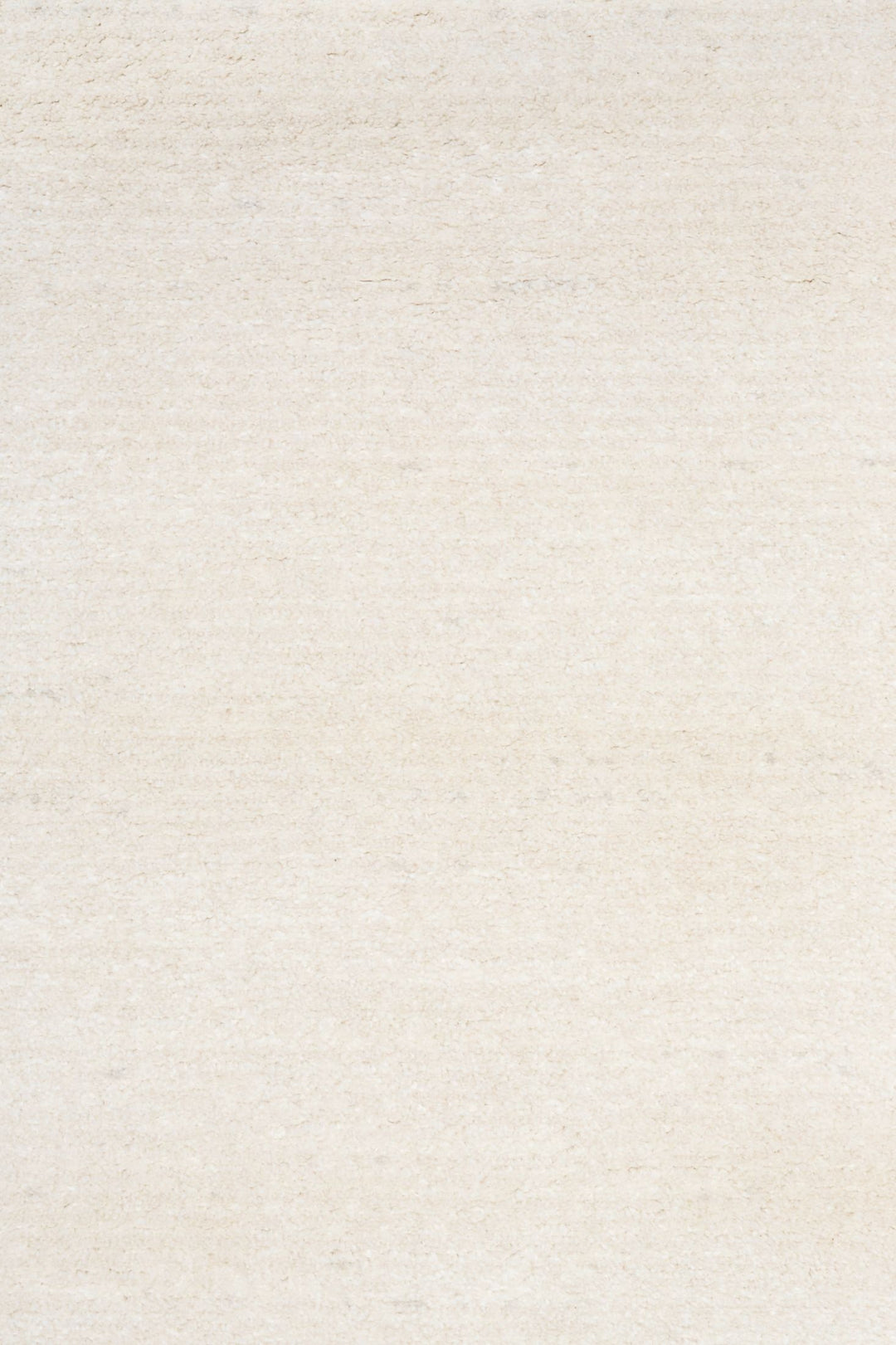 Close-up of beige textured rug fabric.