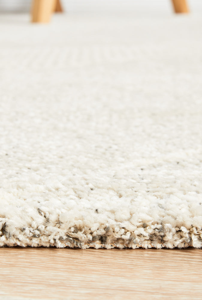 Detailed view of grey geometric patterns on Alpine 822 modern designer rug
