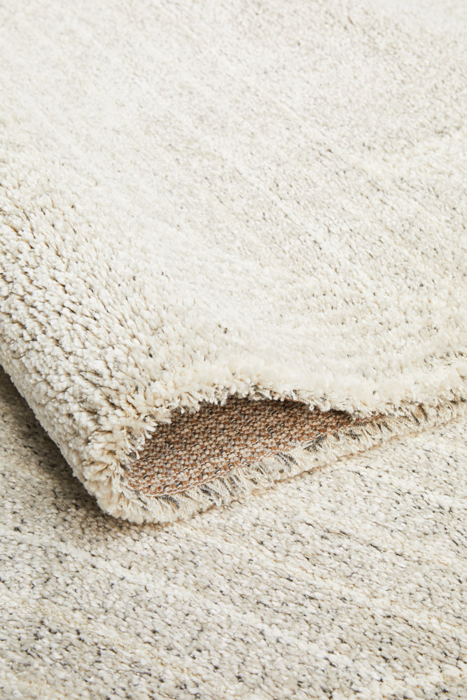 Alpine 822 Grey designer rug styling showing rug backing