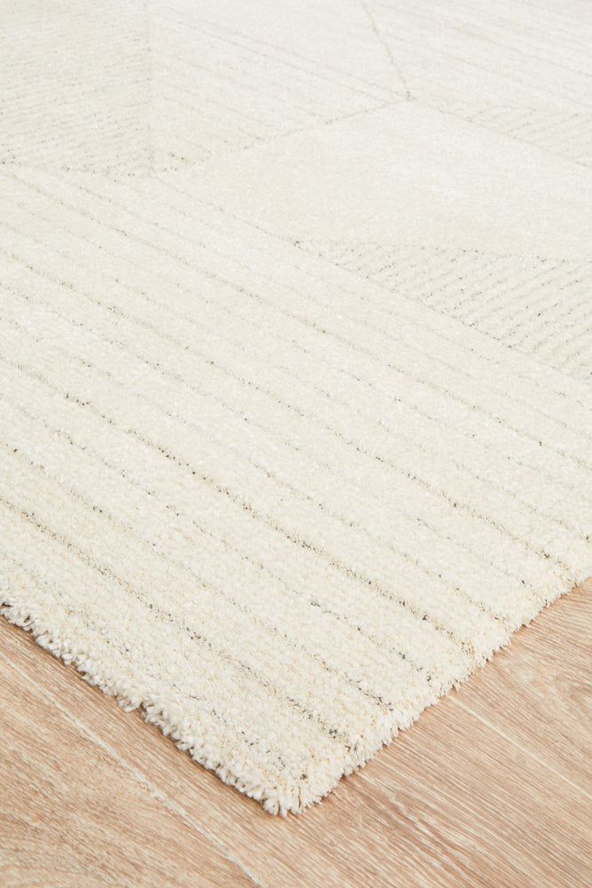 Close-up soft plush pile texture of Alpine 822 Natural designer rug