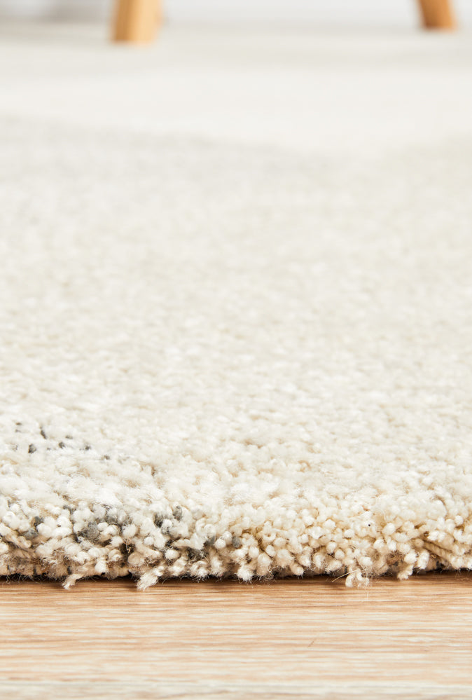 Close-up texture of Alpine 833 Stone rug showing thick plush pile weave detail