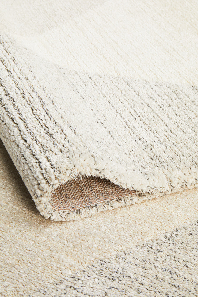 Detailed shot of Alpine 833 Stone rug showing the backing