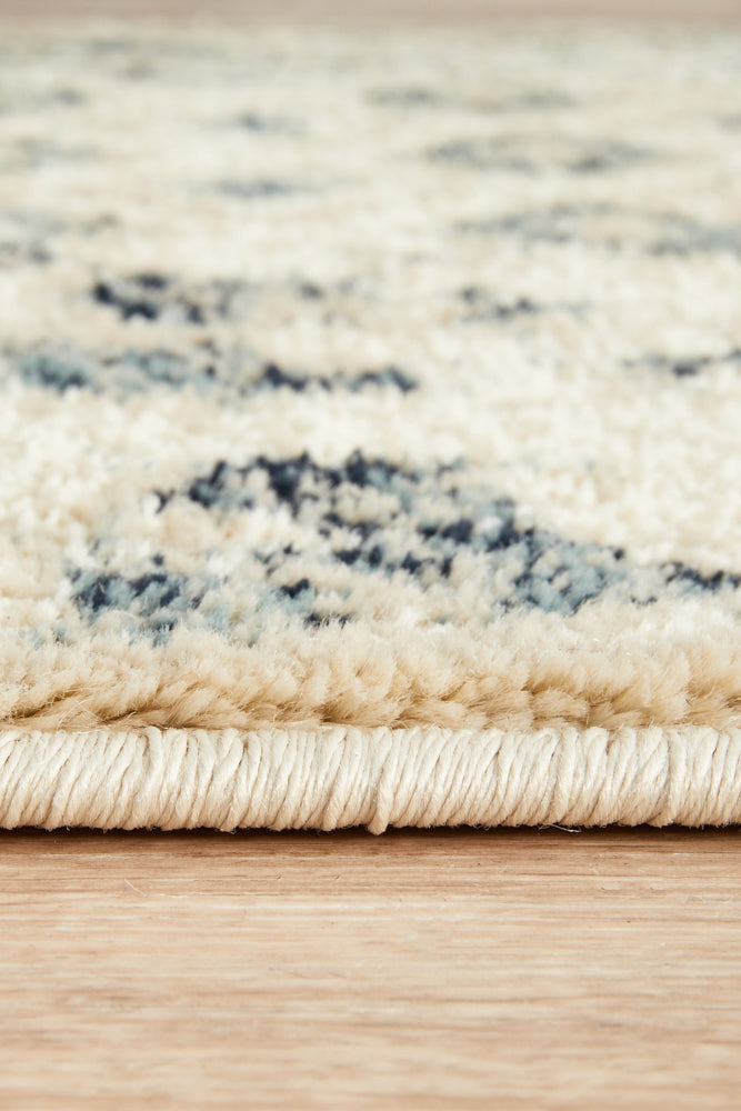 Oxford Illusion Blue runner rug on wooden floor showing dimensional pattern effect Trends Rugs