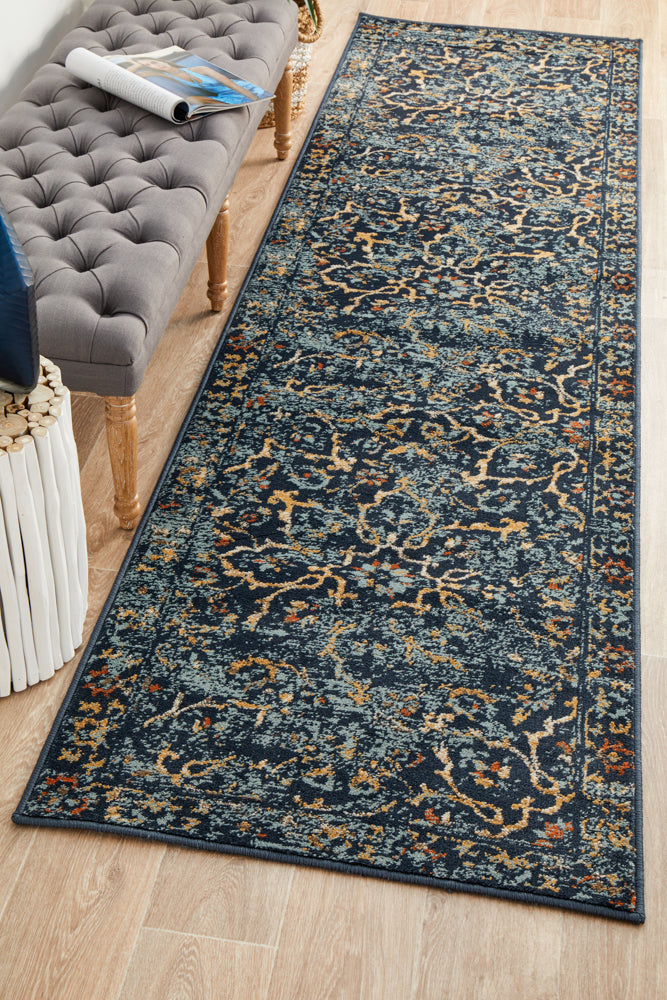 Oxford Stem Navy runner rug with botanical pattern on hardwood floor