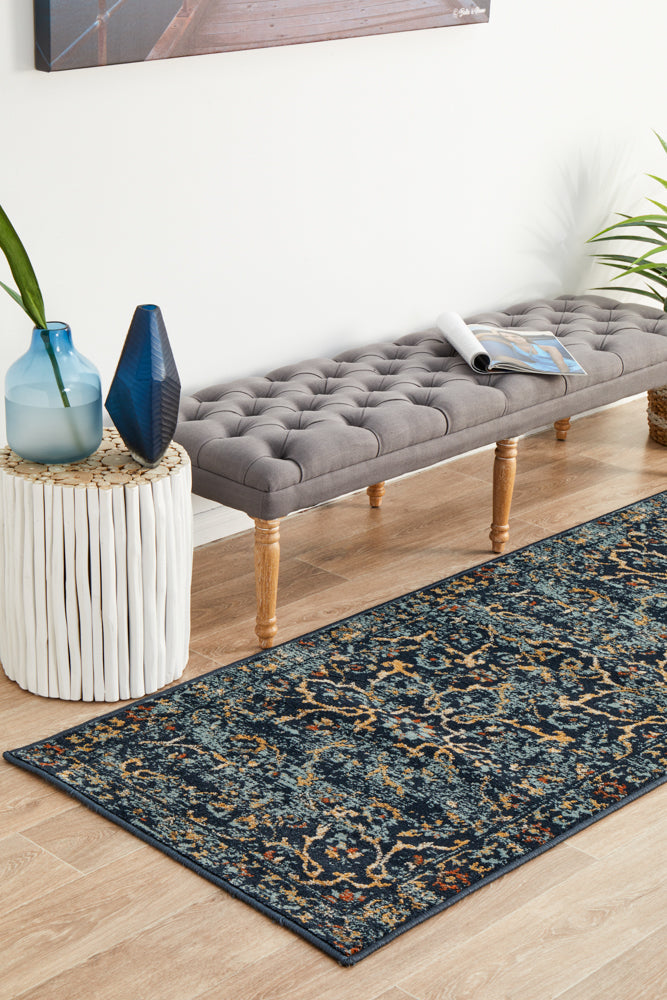 Oxford Stem Navy runner rug with botanical leaf pattern on hardwood floor