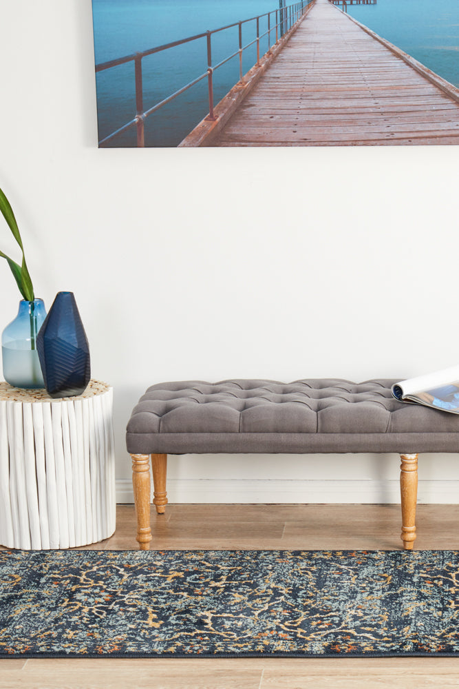 Oxford Stem Navy runner rug placed in modern hallway with white walls