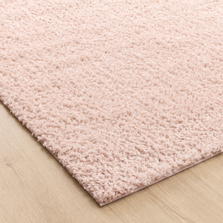 Close-up of Lune Blush Pink Shaggy Rug pile — 40mm ultra-soft non-shedding polyester south morang