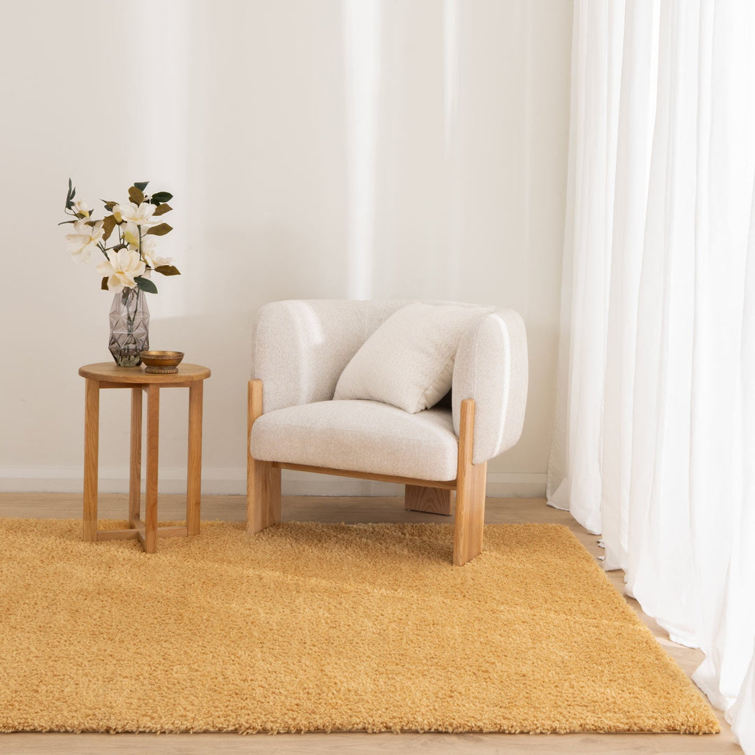 Lune Ochre Shaggy Rug styled in a warm boho Australian living room