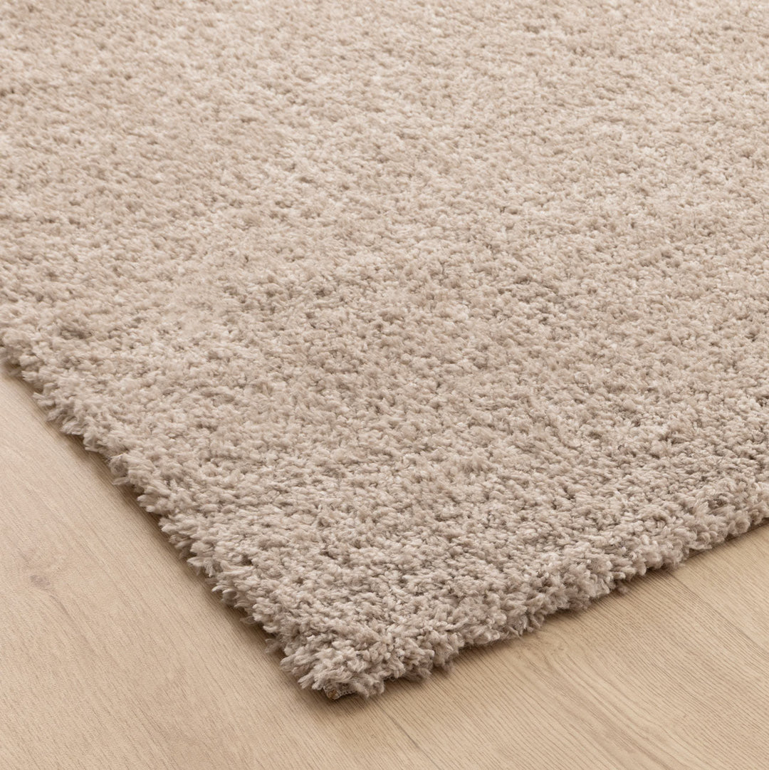 Close-up of Lune Taupe Shaggy Rug pile — 40mm ultra-soft non-shedding polyester