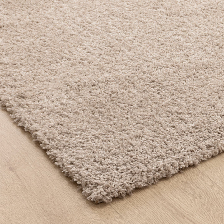 Close-up of Lune Taupe Shaggy Rug pile — 40mm ultra-soft non-shedding polyester