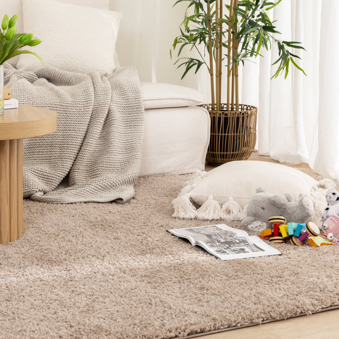 Lune Taupe Shaggy Rug living room with kids toys decor items