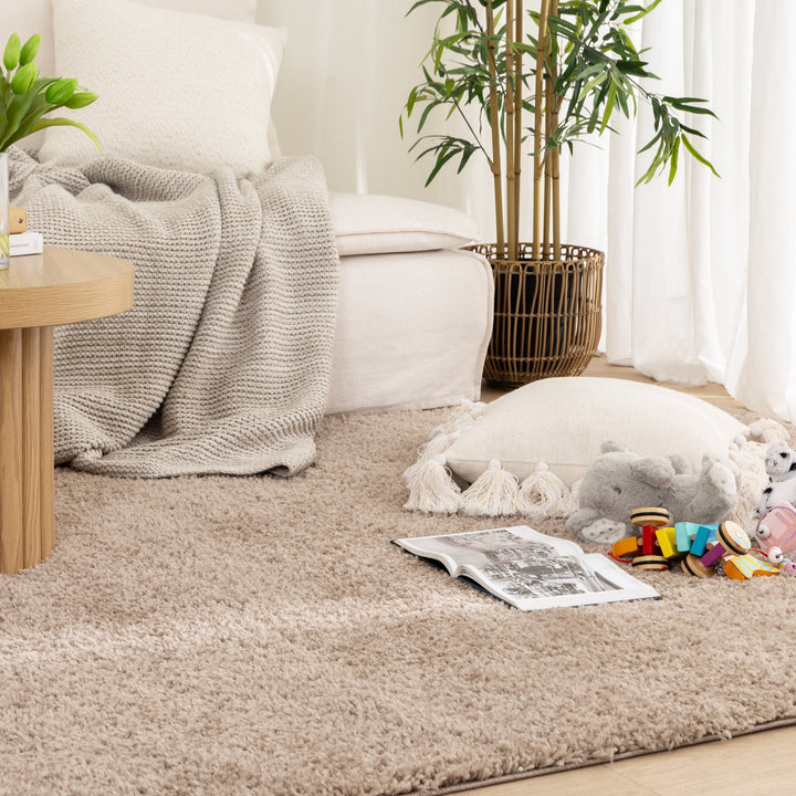 Lune Taupe Shaggy Rug living room with kids toys decor items