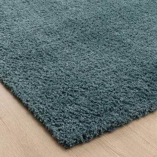 Close-up of Lune Teal Shaggy Rug pile — 40mm ultra-soft non-shedding polyester